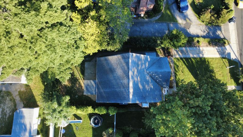 Overhead drone photo of a house, lot and street in West Hempstead, NY