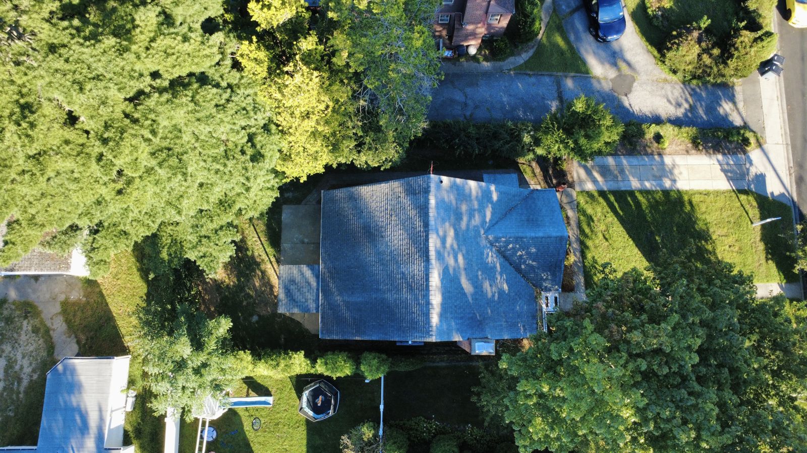 Overhead drone photo of the same West Hempstead home and its lot